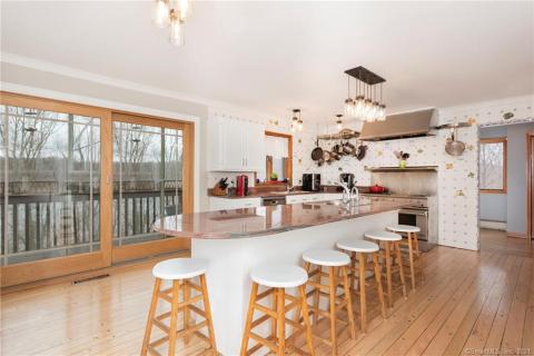 Dining room with wonderful views. After dinner, open the French doors for drinks on the balcony.