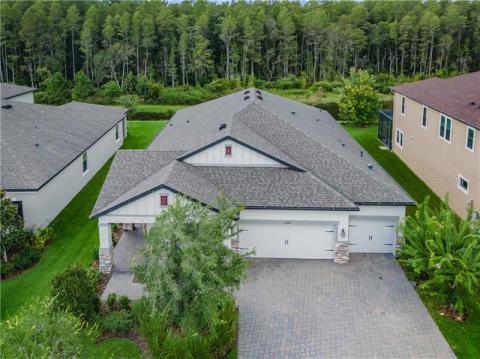 Welcome home to 13376 Batten Lane in Starkey Ranch!