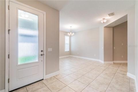 ENORMOUS living room space with upgraded tray ceilings. Private views of the conservation.