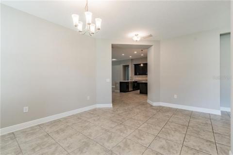 Extended lanai that has been screened in for you! Private and serene views. Gas hookup provided.
