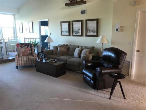 Back wall of living room, comfortable setting.