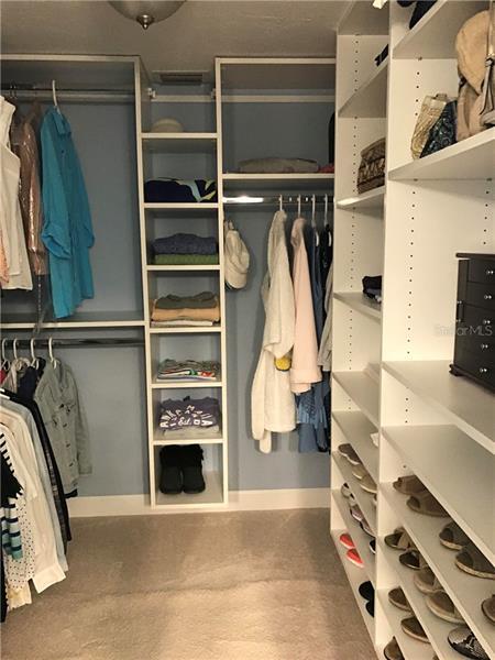 Huge custom closet in master bedroom