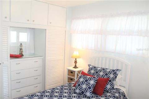 Guest bedroom also has built-in dresser, closets and desk. Guest bedroom also has built-in dresser, closets and desk.
