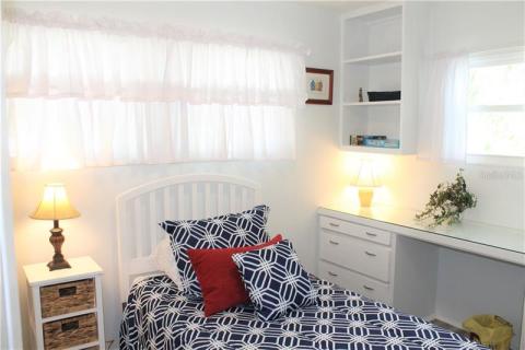 Guest bedroom also has built-in dresser, closets and desk. Guest bedroom also has built-in dresser, closets and desk.
