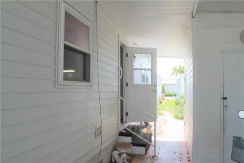 Side door open, private full size laundry in building on right. Side door open, private full size laundry in building on right.