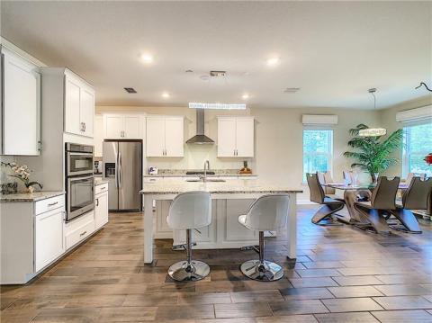 Chef's kitchen and casual breakfast area