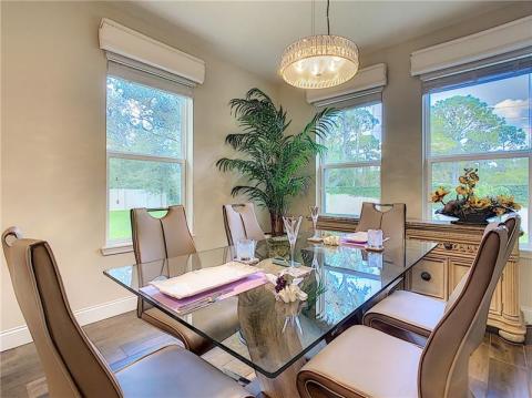 Upgraded led light fixtures and cornices in breakfast area