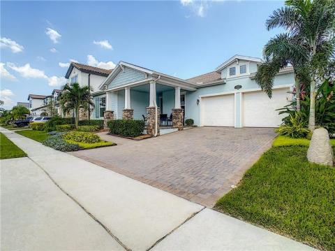 Easy to maintain, HOA includes lawn maintenance and fertilization so you may enjoy outdoor entertaining on the oversized screened and tiled lanai.