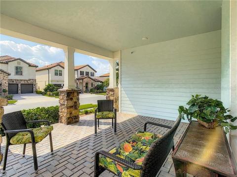 Ample front porch with sealed pavers