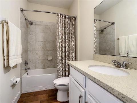 Bathroom #3 with tub and height raised vanity