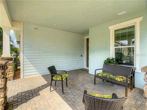 Ample covered and paved front porch