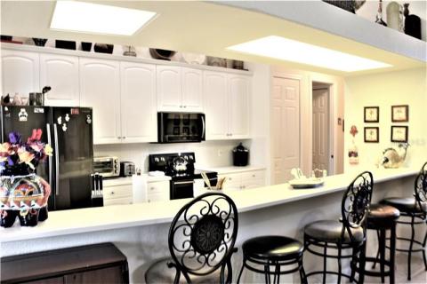 Breakfast bar area with 5 stools