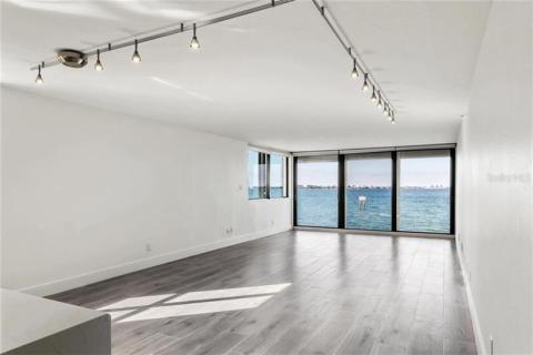 Floor to ceiling glass and new porcelain plank floors