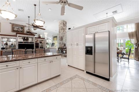 Kitchen with view of family room