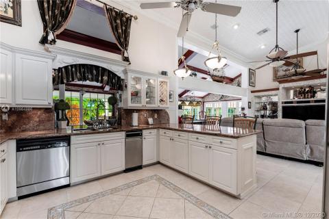 Kitchen with view of family room