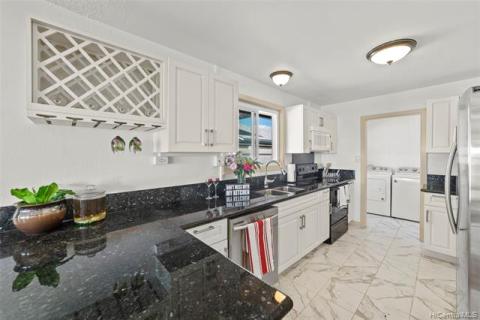 Laundry/Utility room that leads out to the garage