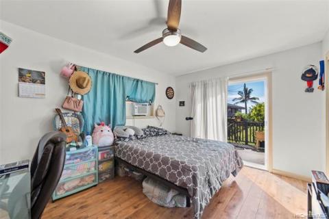 Front house master bedroom with full bath and lanai porch.