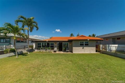 Back yard view of Main Beach home