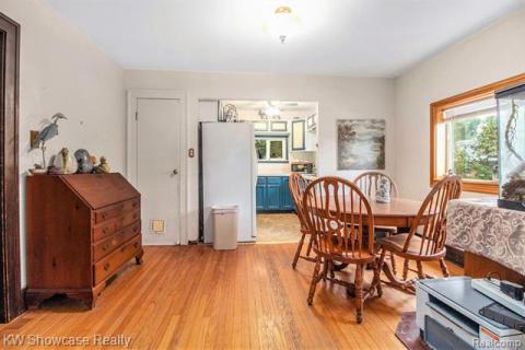 Dining room featuring light wood finished floors and ceiling fan