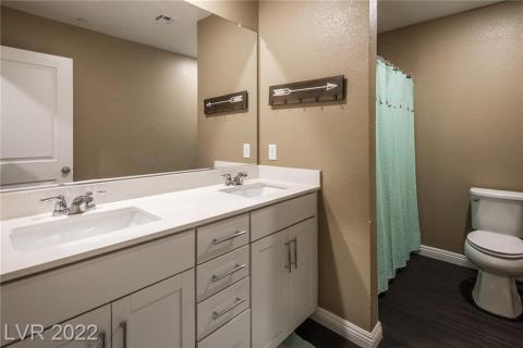 Guest bathroom with double sinks