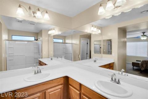 Double sinks in primary bedroom bath