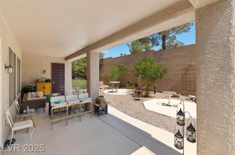 Fenced backyard featuring a patio