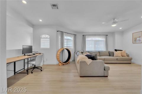 Upstairs Living area with recessed lighting, light wood-type flooring, an office area, and ceiling fan. Could be converted to a 3rd bedroom with remaining space for an office/loft.
