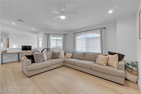 Upstairs Living area featuring recessed lighting, light wood-style flooring, and a ceiling fan. This space is large enough to convert to a 3rd bedroom and still have room for a loft.