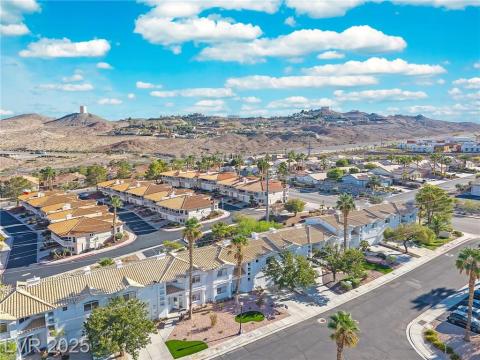 Aerial perspective of suburban area featuring mountains