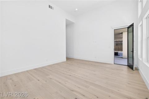 Primary Bedroom with private backyard entry - Primary Suite is separate from secondary bedrooms Primary Bedroom with private backyard entry - Primary Suite is separate from secondary bedrooms
