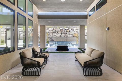 Covered patio off the entry foyer - includes speakers in ceiling Covered patio off the entry foyer - includes speakers in ceiling