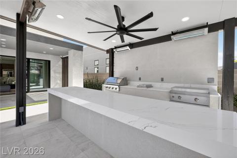 Pergola with 4 heaters, recessed lighting & ceiling fan. BBQ, 1 cooktop & restaurant like grill. Bar seating Pergola with 4 heaters, recessed lighting & ceiling fan. BBQ, 1 cooktop & restaurant like grill. Bar seating