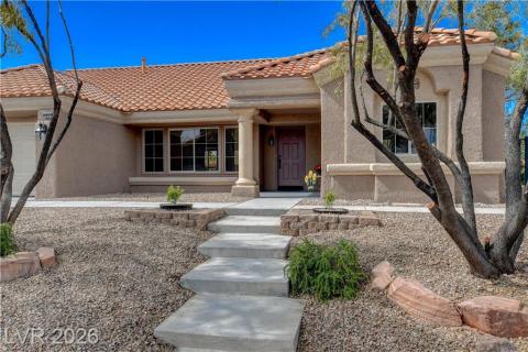 This desert dwelling presents an inviting entrance with its distinctive architecture and xeriscape landscaping. This desert dwelling presents an inviting entrance with its distinctive architecture and xeriscape landscaping.