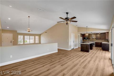 This bright, open concept living space features a functional kitchen island and inviting ambiance. This bright, open concept living space features a functional kitchen island and inviting ambiance.