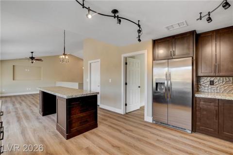 This bright kitchen features sleek stainless steel appliances. This bright kitchen features sleek stainless steel appliances.