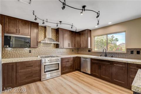 This thoughtfully designed kitchen offers a stylish space for culinary creations. This thoughtfully designed kitchen offers a stylish space for culinary creations.
