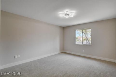This serene bedroom offers a peaceful retreat with ample natural light. This serene bedroom offers a peaceful retreat with ample natural light.