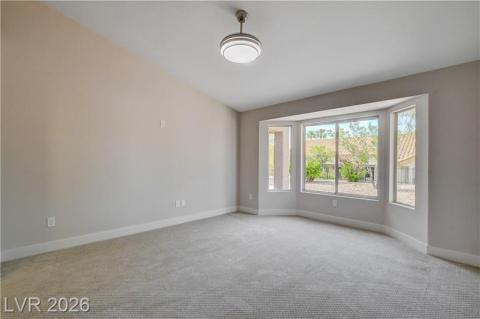 Features a wide bay window overlooking lush greenery, offering an inviting and bright atmosphere. Features a wide bay window overlooking lush greenery, offering an inviting and bright atmosphere.