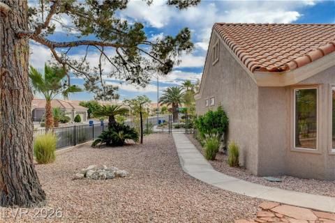 This charming home offers a low-maintenance exterior with attractive landscaping and a tiled roof. This charming home offers a low-maintenance exterior with attractive landscaping and a tiled roof.