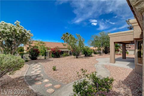 This tranquil exterior offers a charming pathway and a peaceful outdoor living space. This tranquil exterior offers a charming pathway and a peaceful outdoor living space.