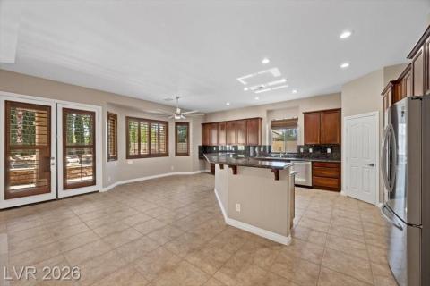 The seamless flow between the living area and kitchen creates an inviting open-concept design.
