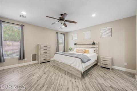 Huge primary bedroom with big windows allowing for a ton of natural light. Huge primary bedroom with big windows allowing for a ton of natural light.