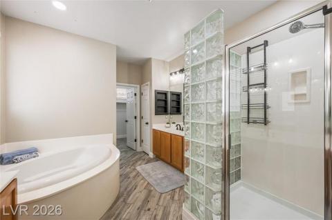 luxurious spa bath with garden tub, separate his and her vanities luxurious spa bath with garden tub, separate his and her vanities