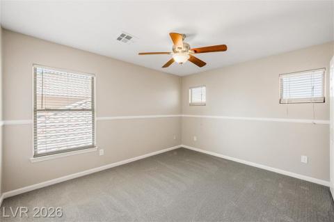 Another large upstairs bedroom with ceiling fan. Another large upstairs bedroom with ceiling fan.
