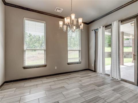 DINETTE WITH EXIT TO THE COVERED PATIO