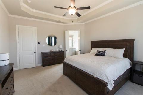 High ceilings in the master with plenty of room for large furniture