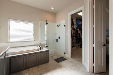 Big tub to soak in after a long day. Seamless shower.