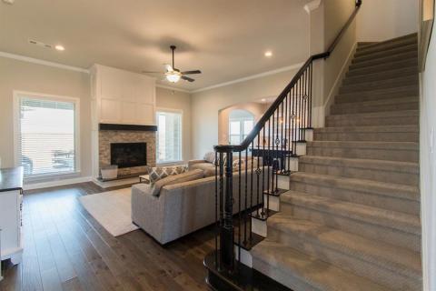 Stairway to gameroom and half bath