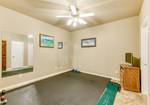 Current owners use bonus room for exercise room.