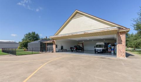 View of hangar with bi-fold door open.